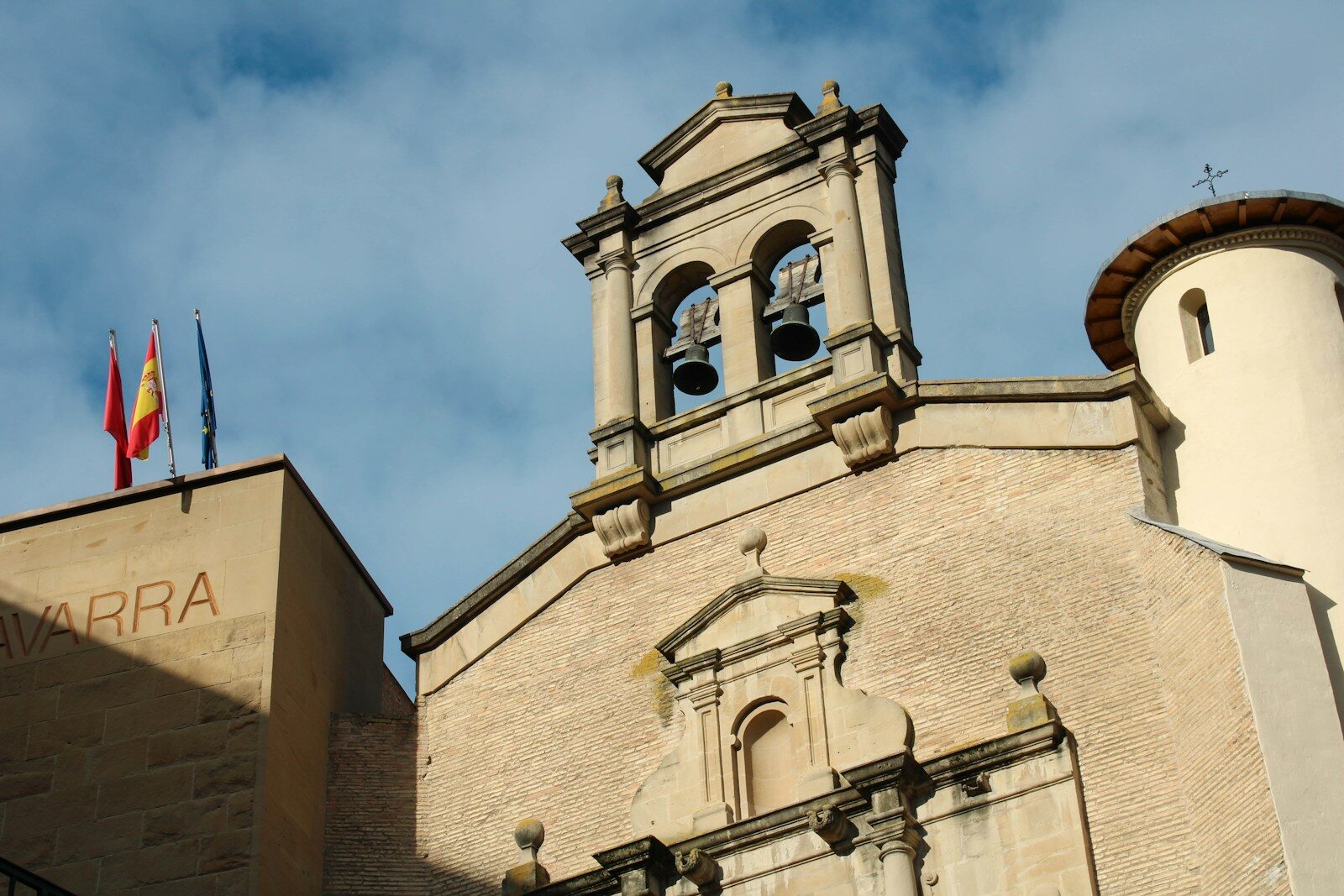 a tall building with a clock on the top of it